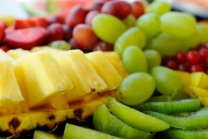 A close up of some fruit on a plate